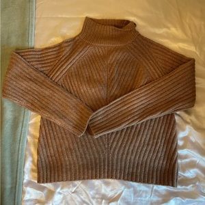 Pink turtleneck sweater